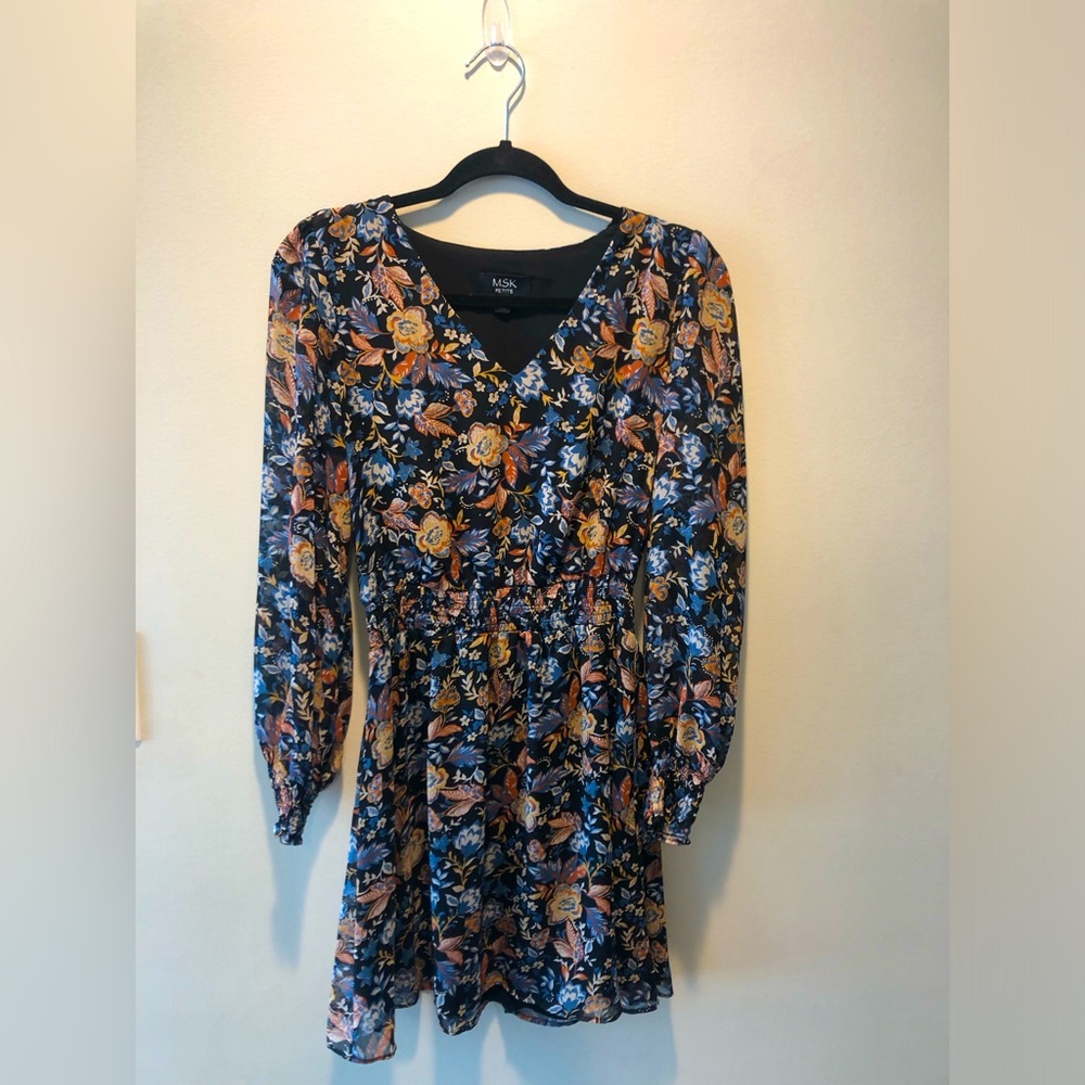 Long sleeve, short flower print dress.